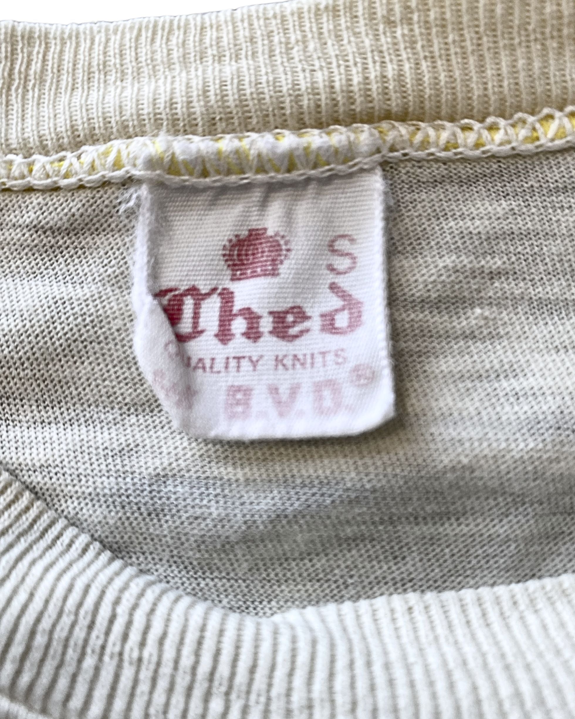 Close-up of BVD tag on vintage Ferrari T-shirt, size small.