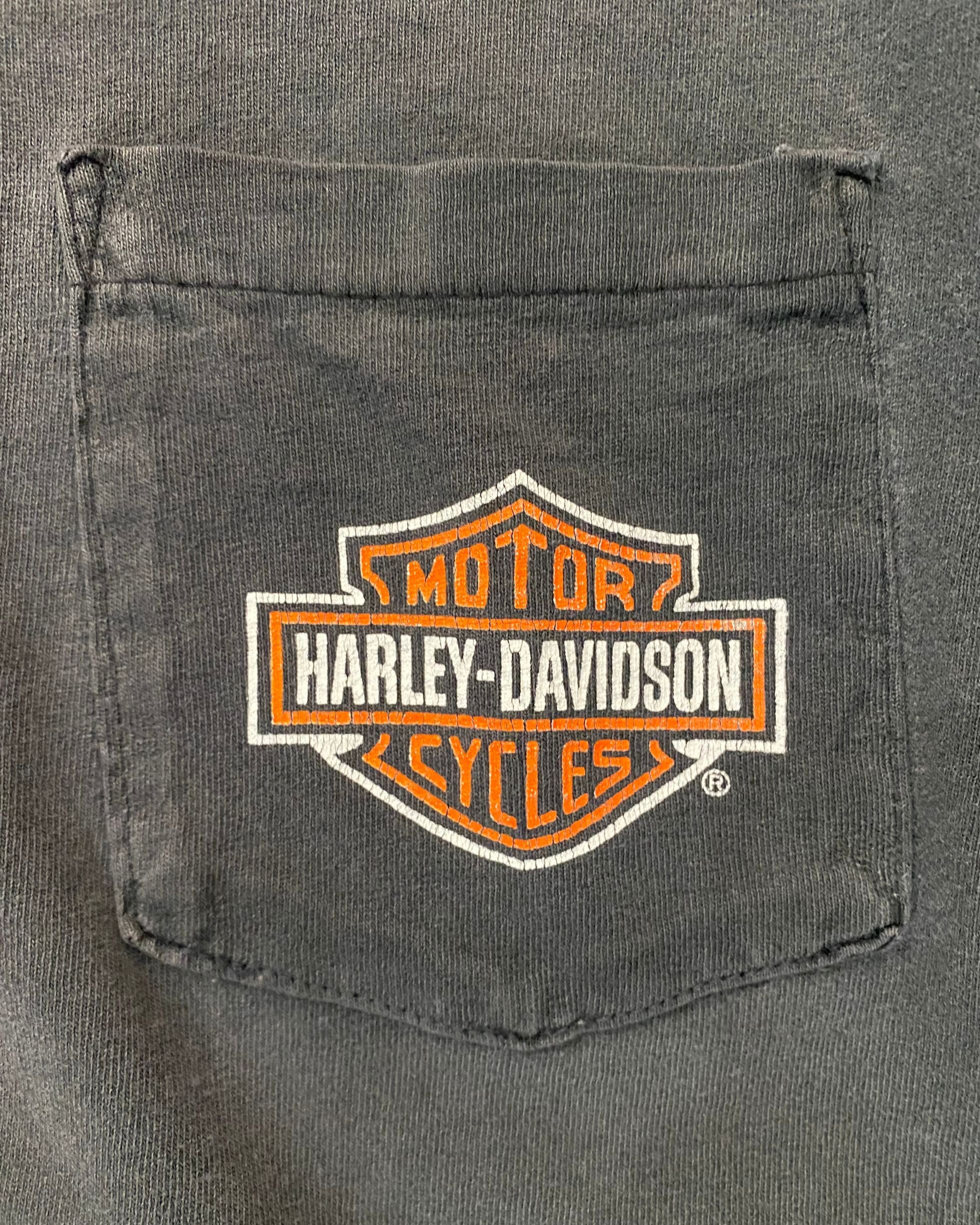 Close-up of chest pocket showing Harley-Davidson logo detail.
