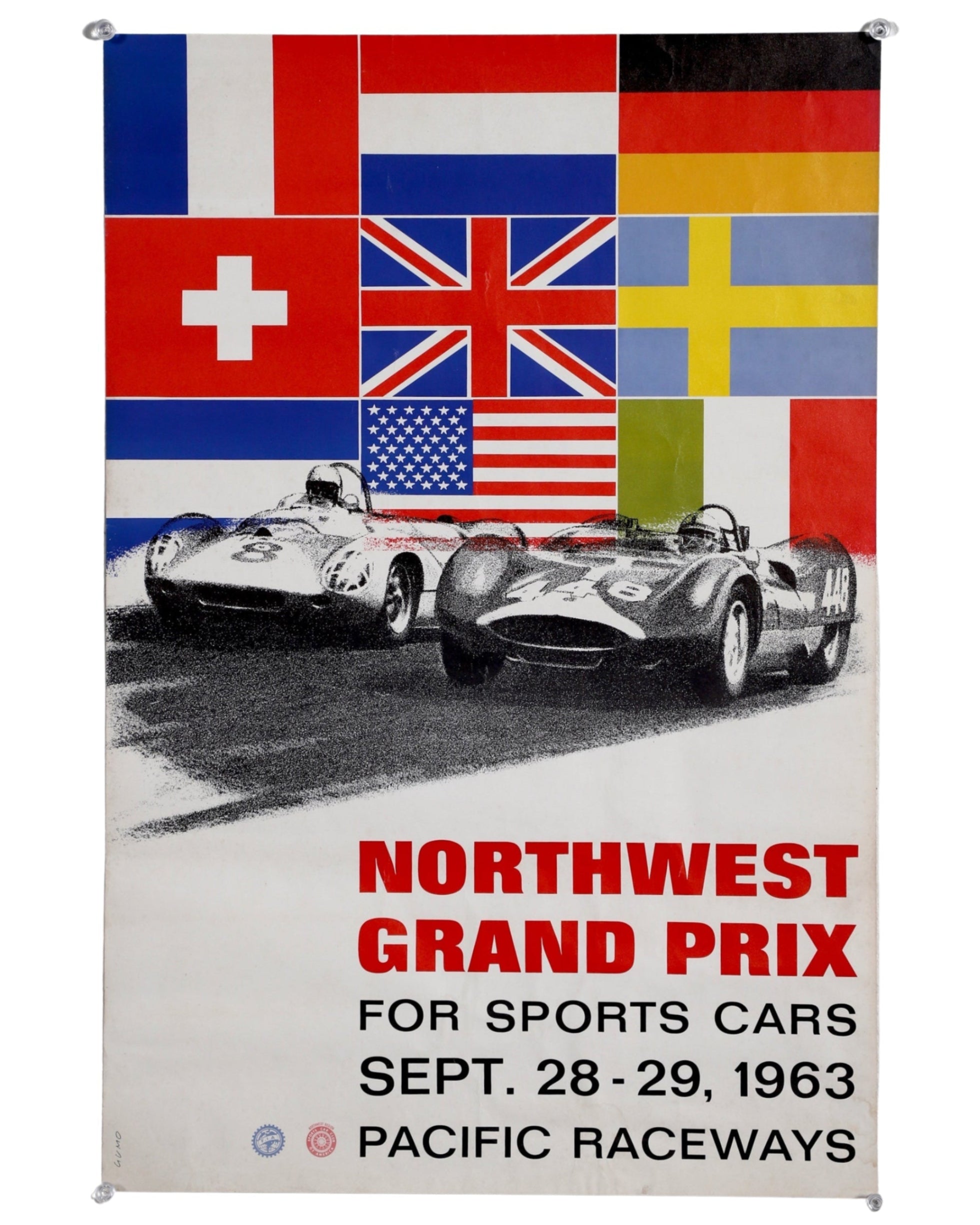 Original 1963 Northwest Grand Prix poster with race cars and flags.