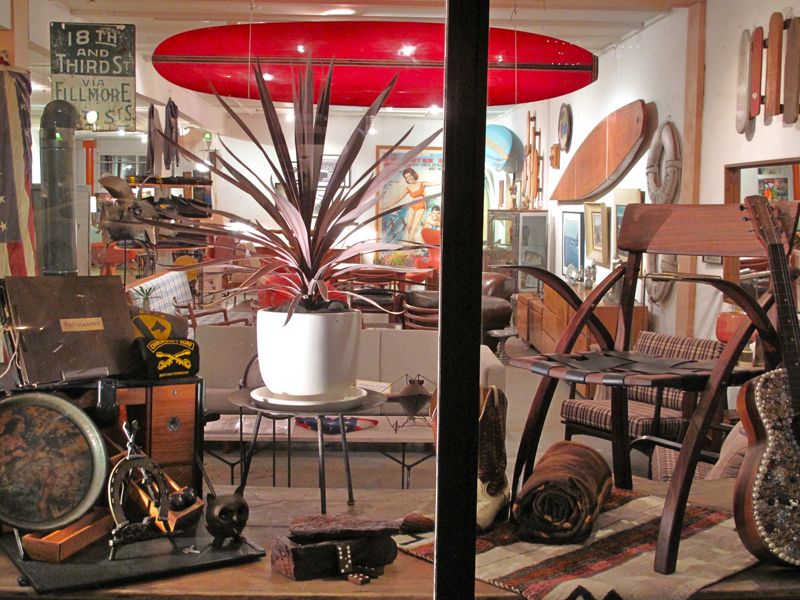 Full View of Window Storefront Containing Surf and Surfing Cowboys Merchandise