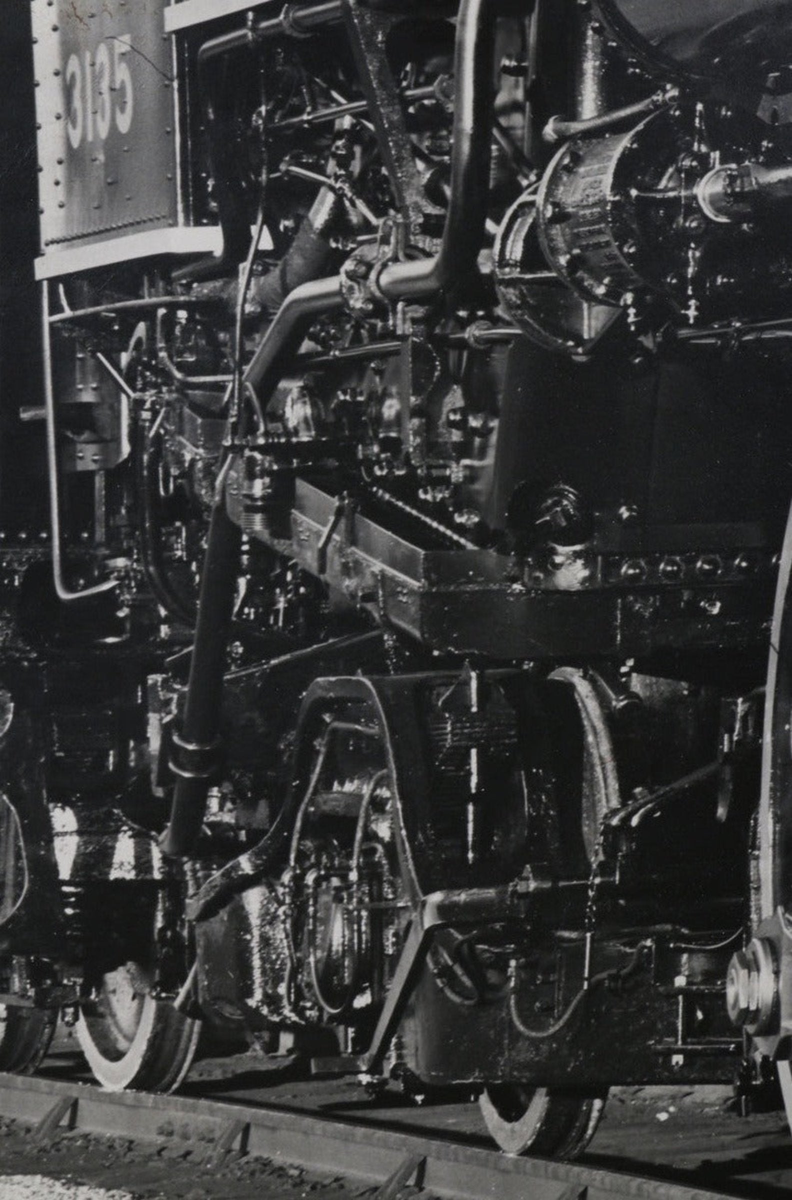 The upclose view of the engine in the 1940s New York Central Locomotive Train #3135 Photograph.