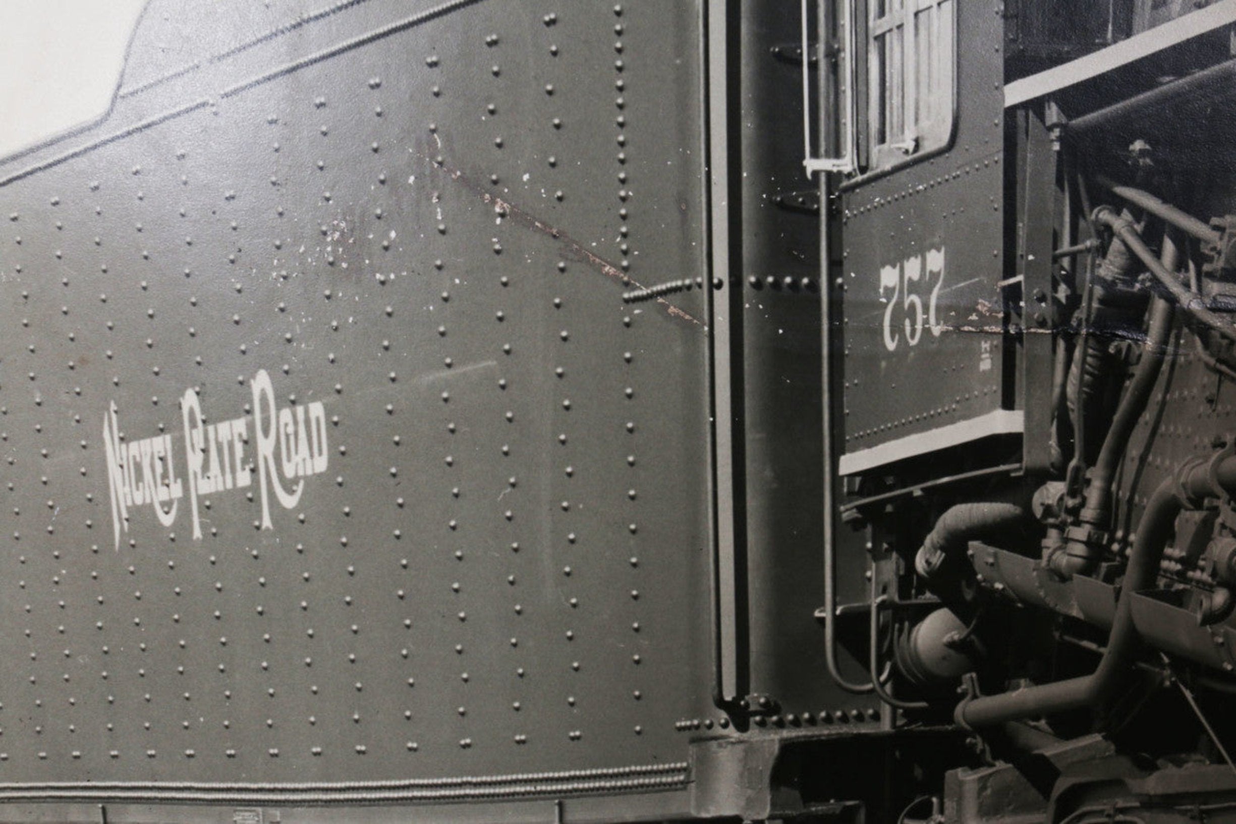 The zoomed in middle and name/number of the 1940s Nickel Plate Road Locomotive Train Engine #757 Black and White Photograph.