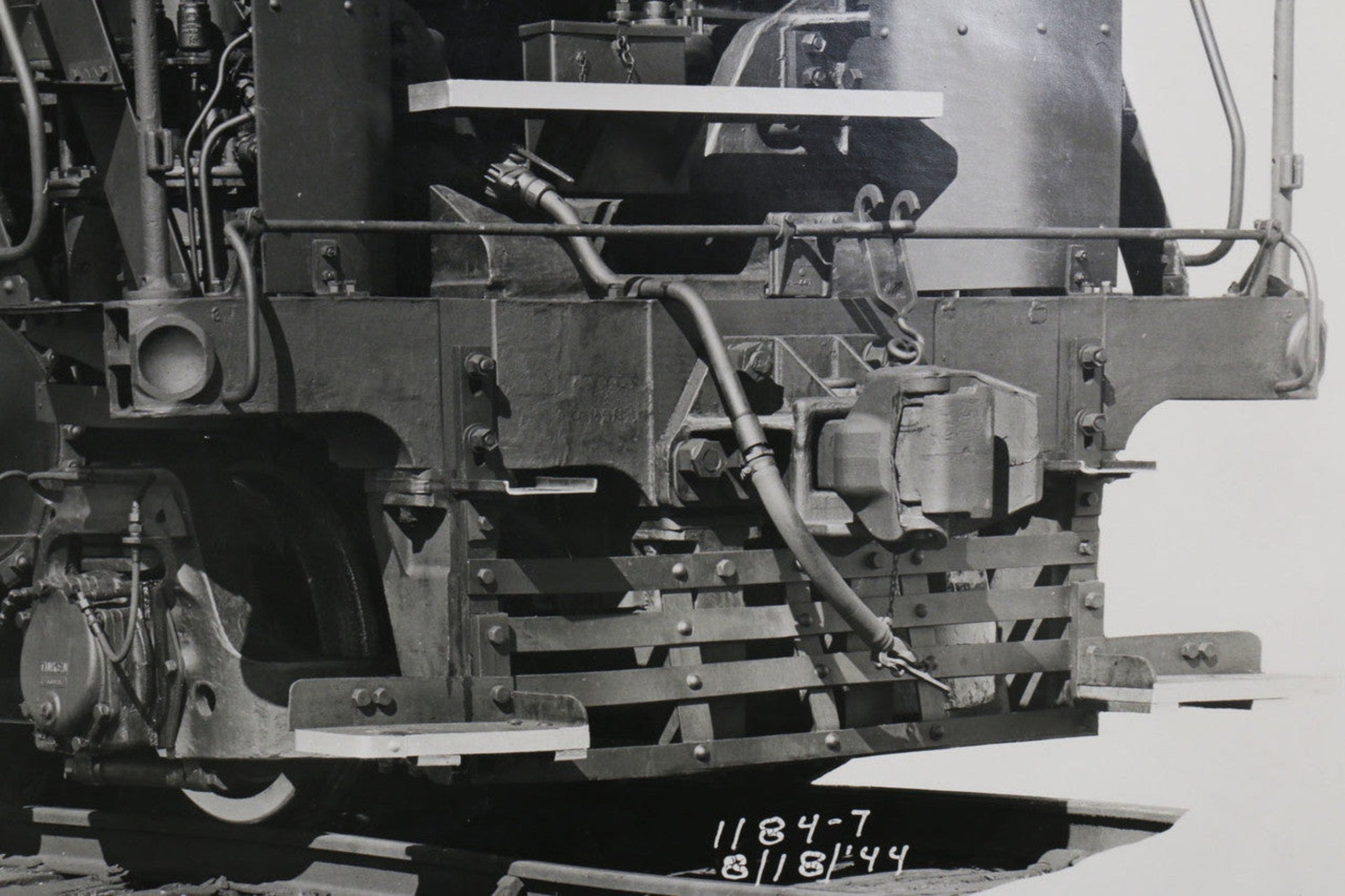 The zoomed in bottom right corner showing the date and numbering of the 1940s Nickel Plate Road Locomotive Train Engine #757 Black and White Photograph.