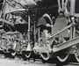 The zoomed in wheels and engine of the 1940s Nickel Plate Road Locomotive Train Engine #757 Black and White Photograph.