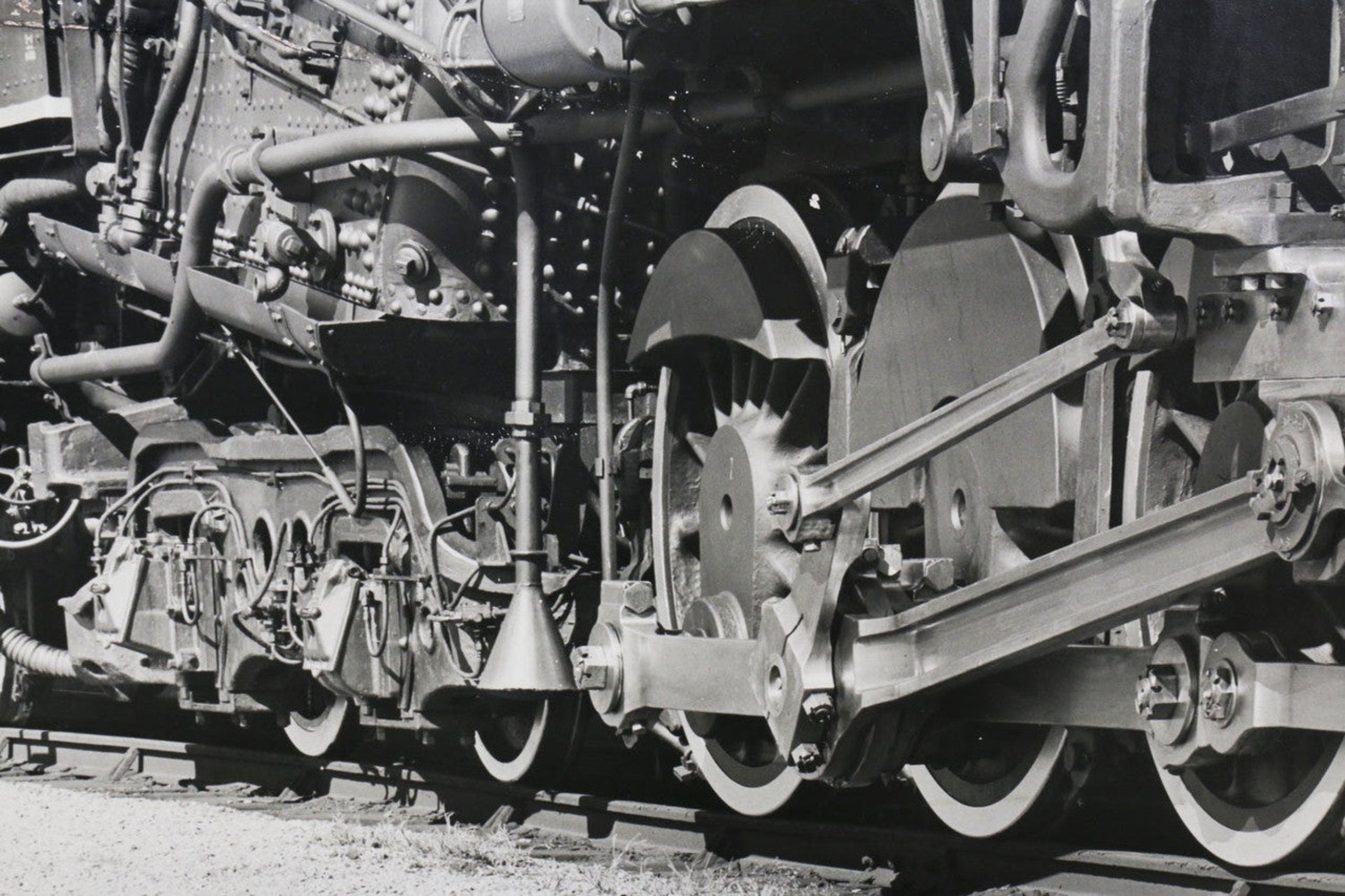 The zoomed in wheels and engine of the 1940s Nickel Plate Road Locomotive Train Engine #757 Black and White Photograph.