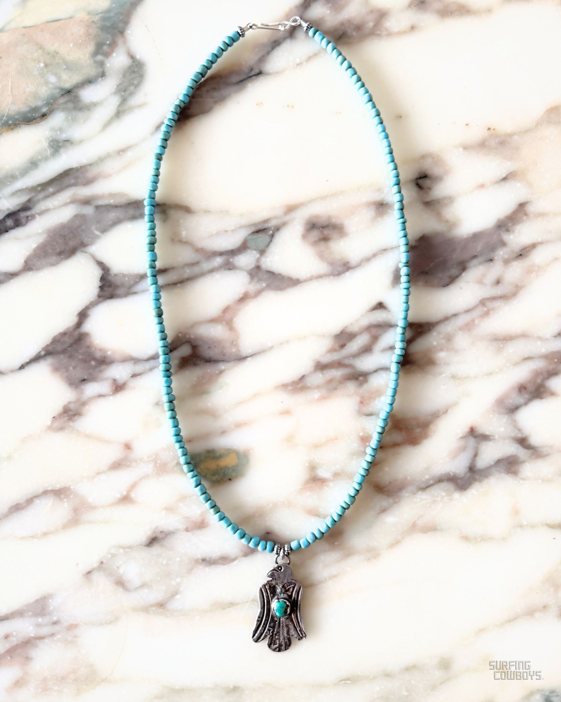 1940s Thunderbird Pendant on Blue Bead Necklace Full view.