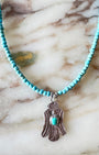 1940s Thunderbird Pendant on Blue Bead Necklace Detail