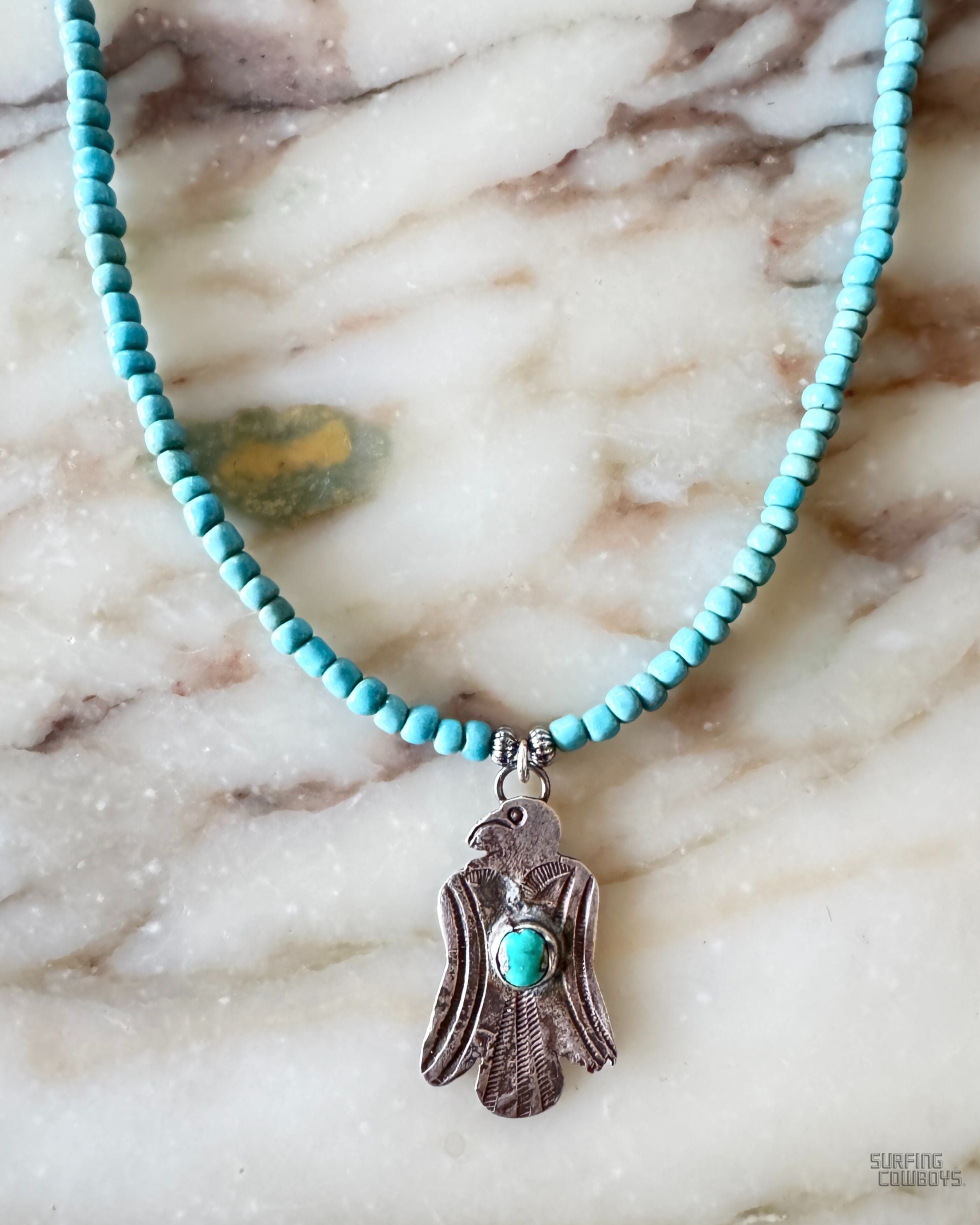 1940s Thunderbird Pendant on Blue Bead Necklace Detail