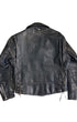 Back view of 1960s vintage biker jacket with lace-up sides and worn leather finish.
