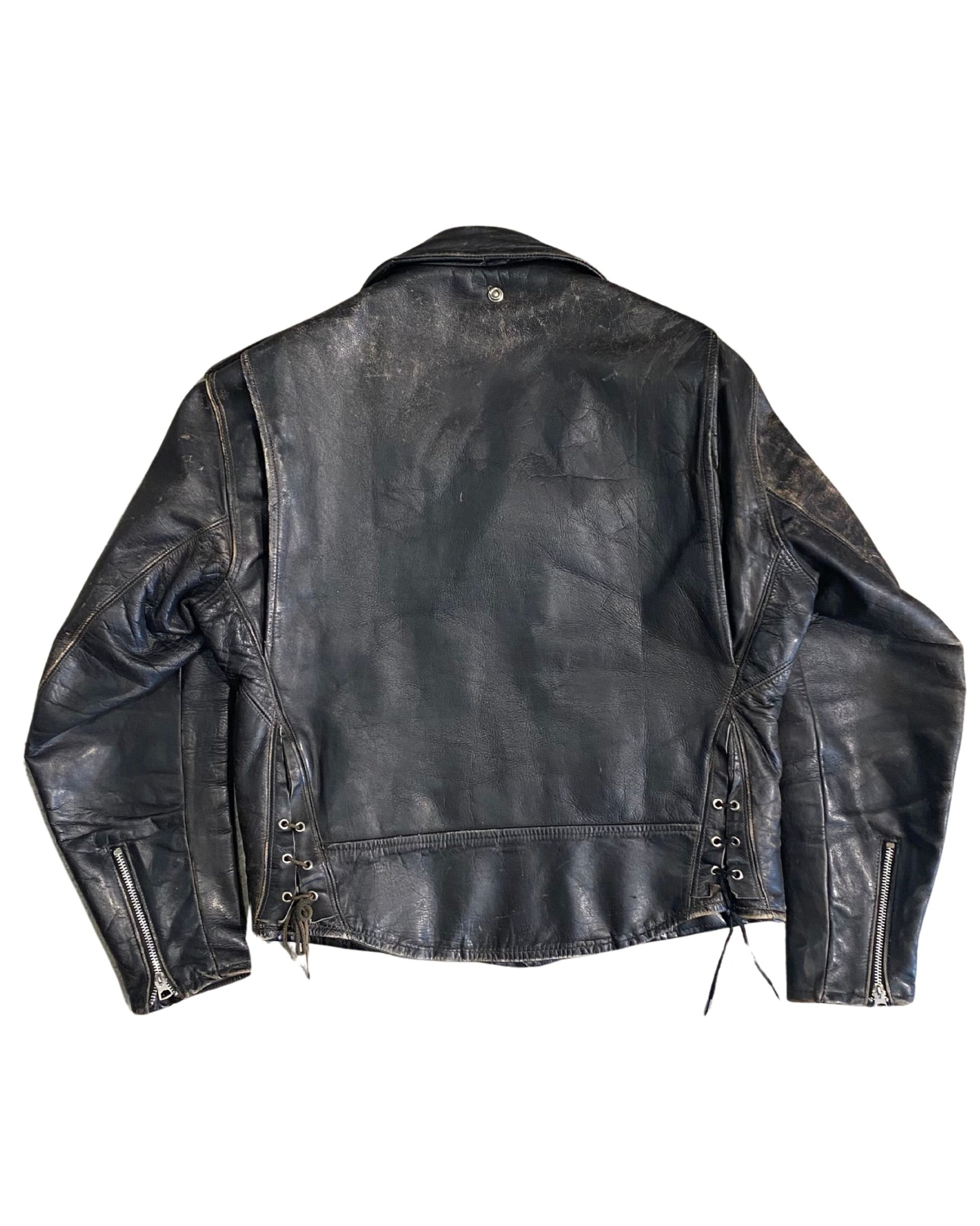 Back view of 1960s vintage biker jacket with lace-up sides and worn leather finish.