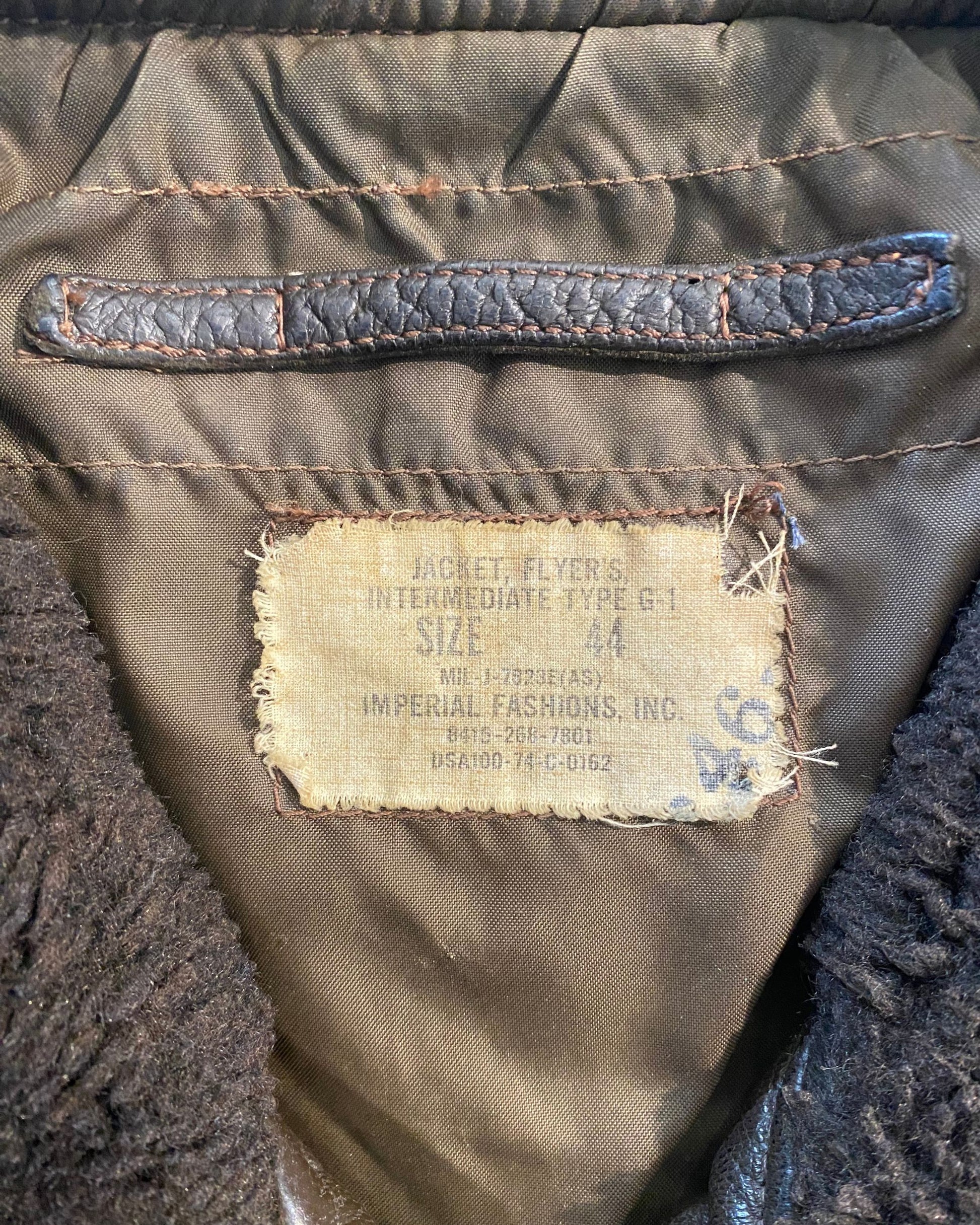 Tag detail of Imperial Fashions G-1 leather jacket, size 44.