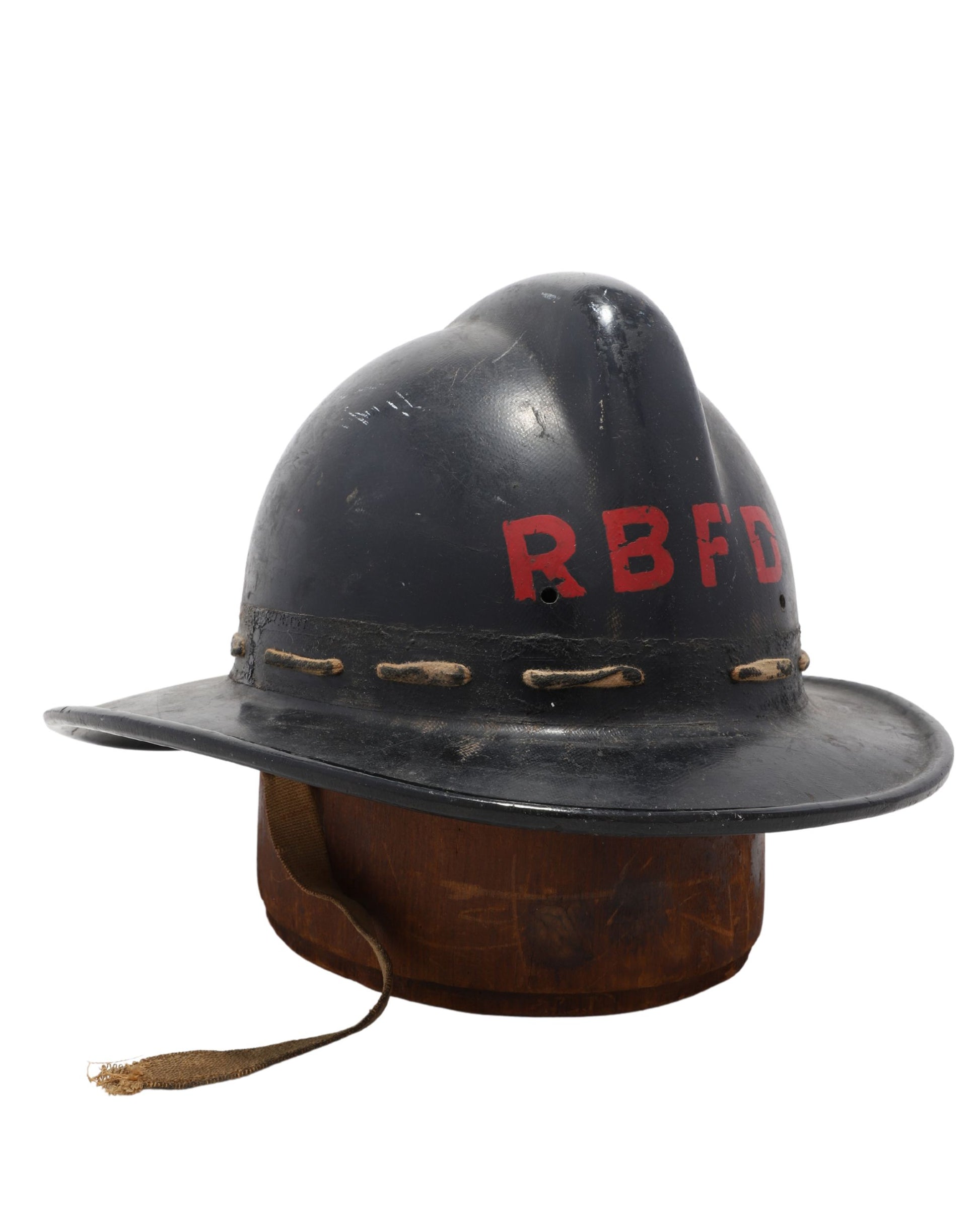 Front view showing red “RBFD” lettering on black fire helmet.