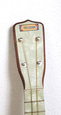1920s Touchdown ukulele faux pearl fretboard.