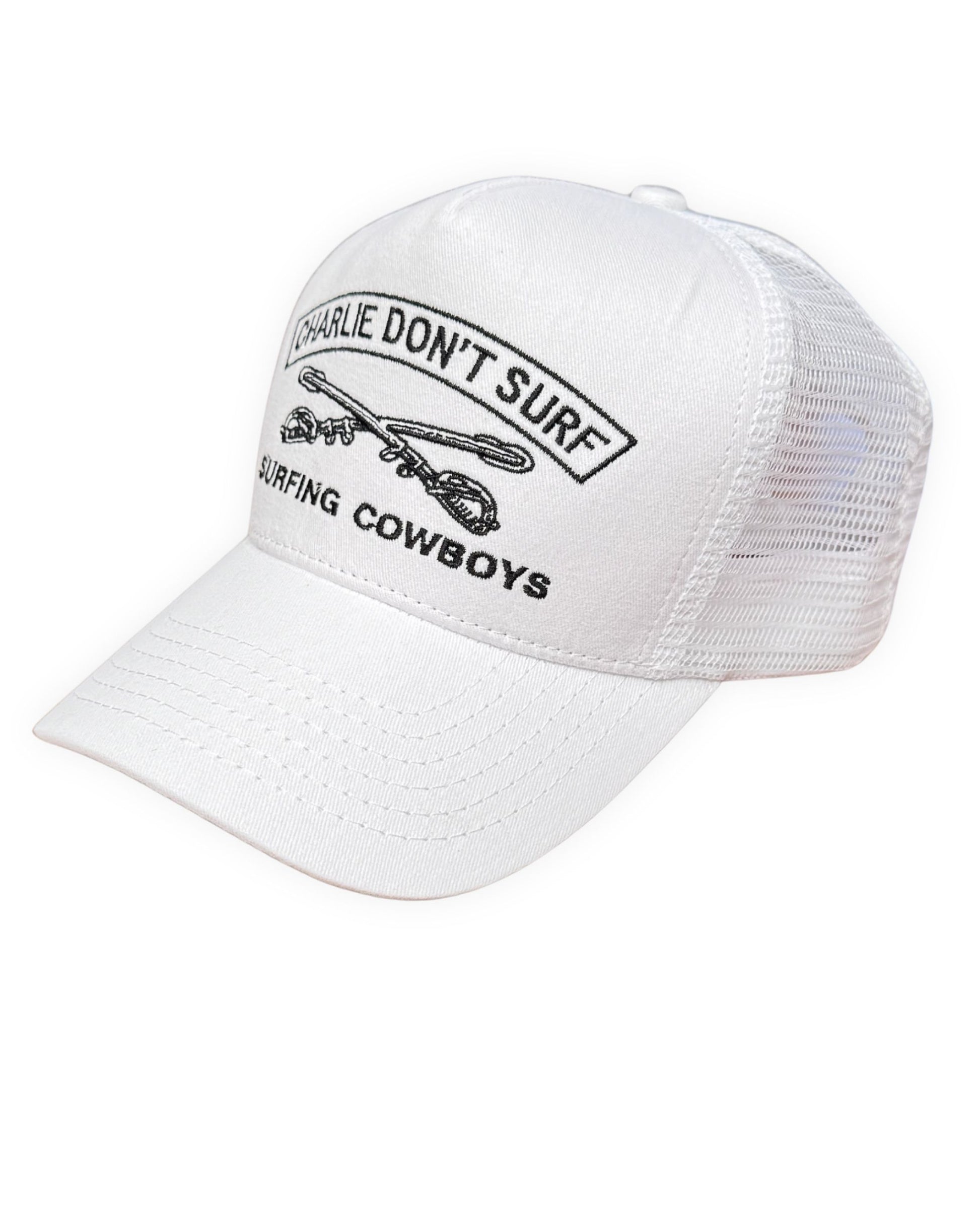 White cap with 'Charlie Don't Surf' and 'Surfing Cowboys' text on a white background