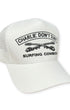 White cap with black text and graphics on a white background
