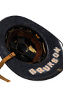 Interior of helmet showing leather liner and name “BRUNSON”.