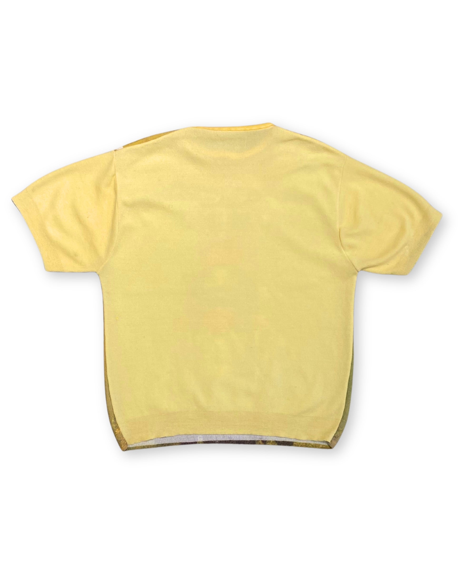 Back view of vintage yellow knit shirt with solid yellow back.