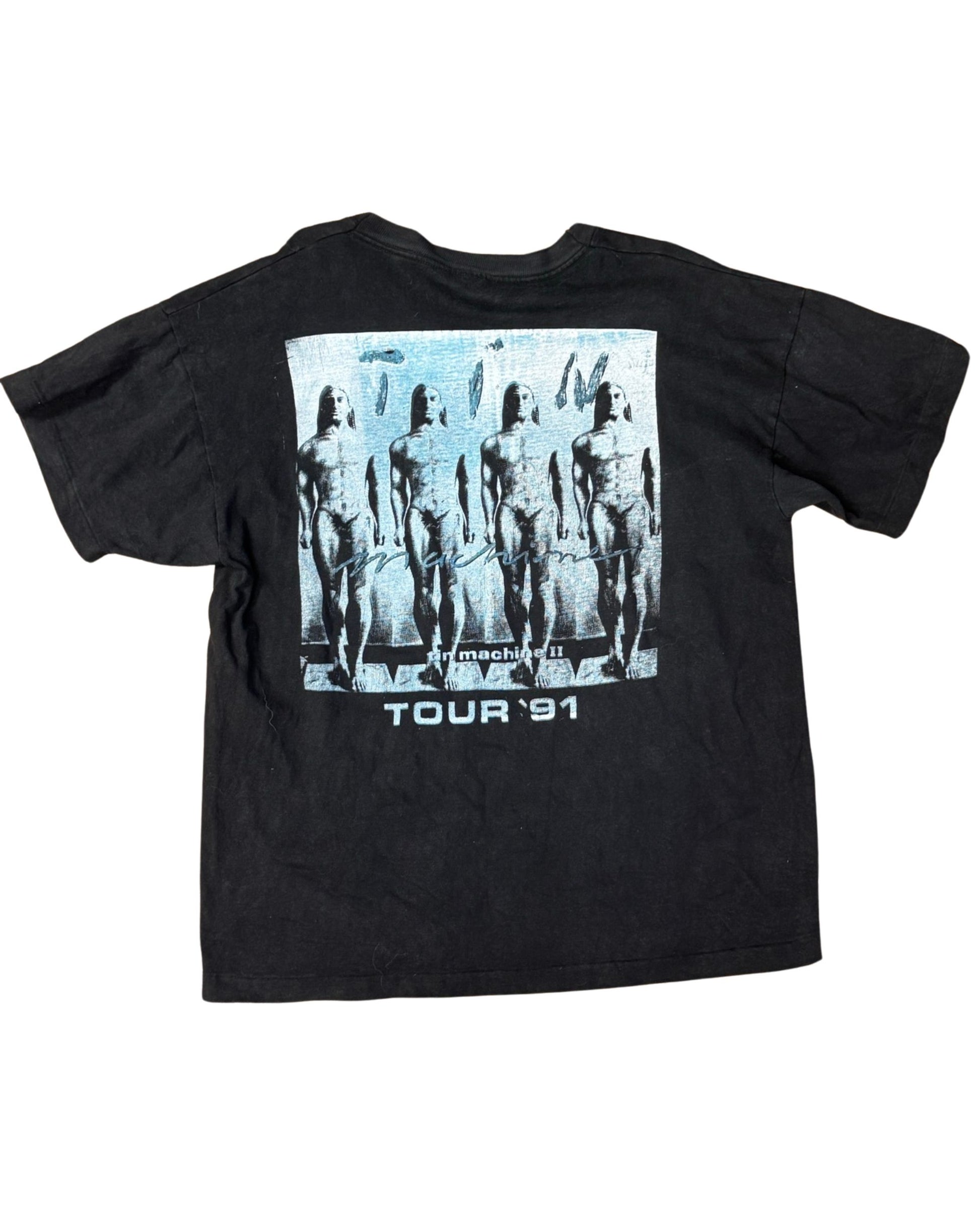  Back of vintage Tin Machine tour tee with surreal lineup of nude figures and “Tour ’91” text.