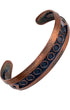 Front view of vintage 1930s Bell Trading Post copper cuff bracelet with Southwestern circle motif and aged patina.