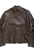Back view of a dark brown Brooks leather motorcycle jacket showing heavy creasing, surface wear, and reinforced lower-back panel.