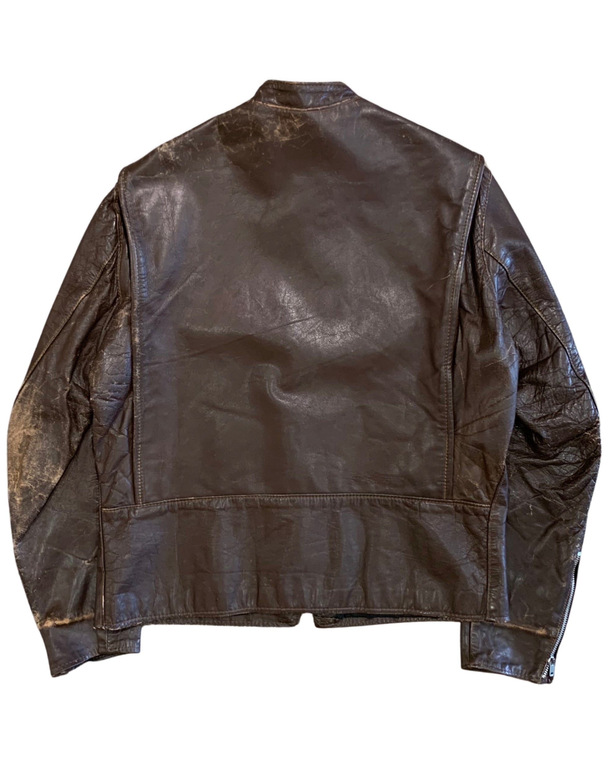 Back view of a dark brown Brooks leather motorcycle jacket showing heavy creasing, surface wear, and reinforced lower-back panel.
