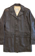 Front view of a brown deerskin Western jacket with pointed collar, button front, and two large patch pockets.
