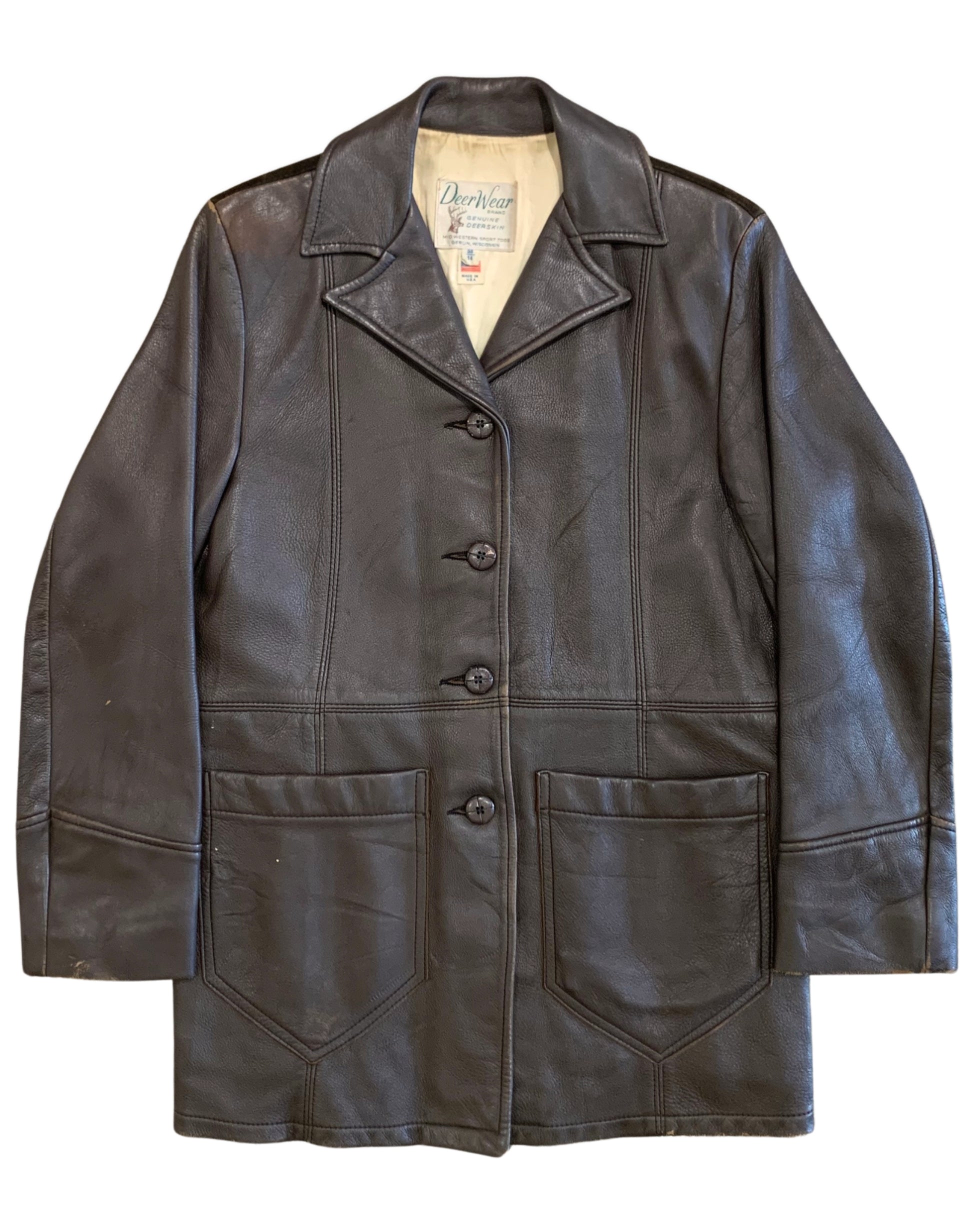 Front view of a brown deerskin Western jacket with pointed collar, button front, and two large patch pockets.
