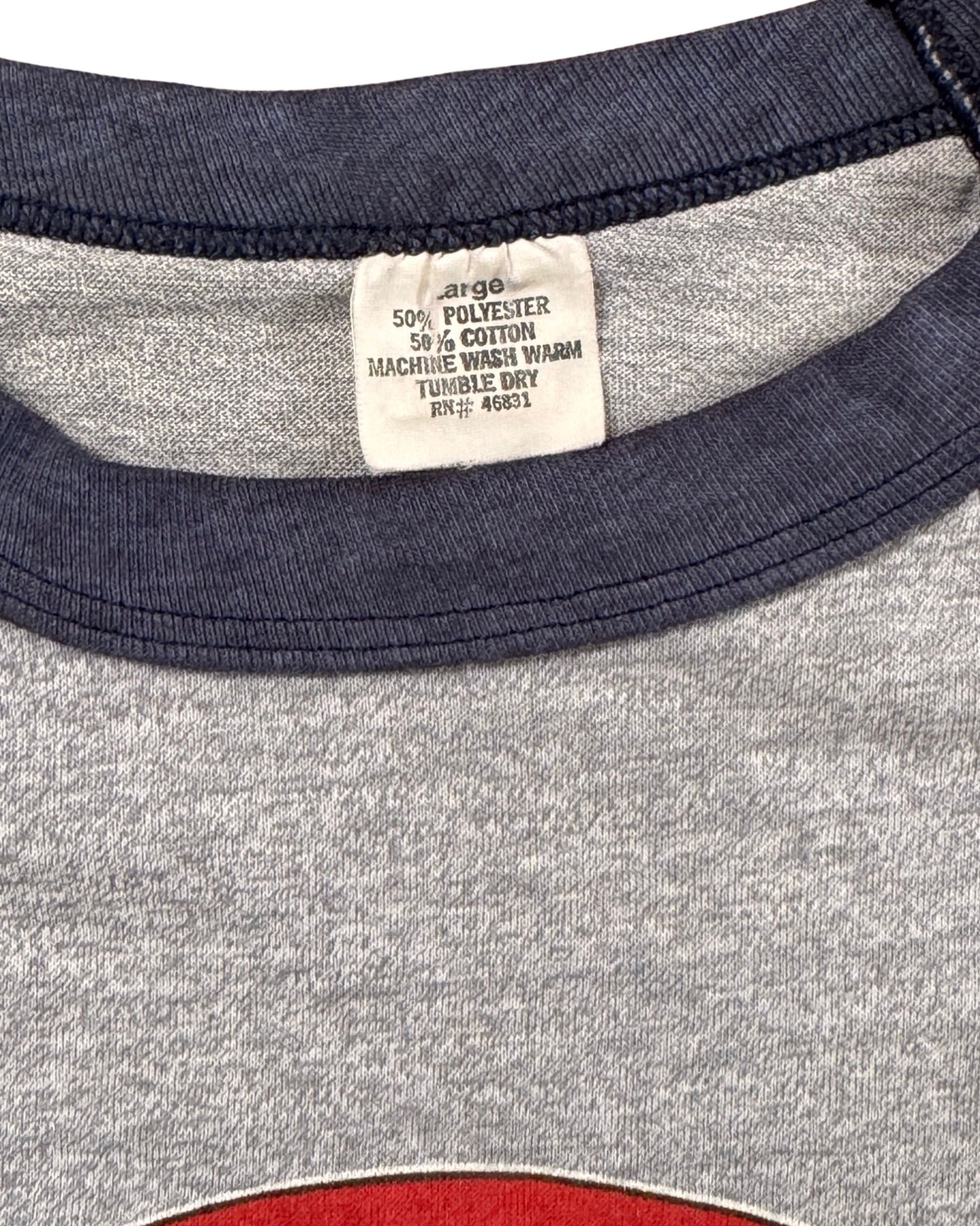 Tag showing size large and fabric content.