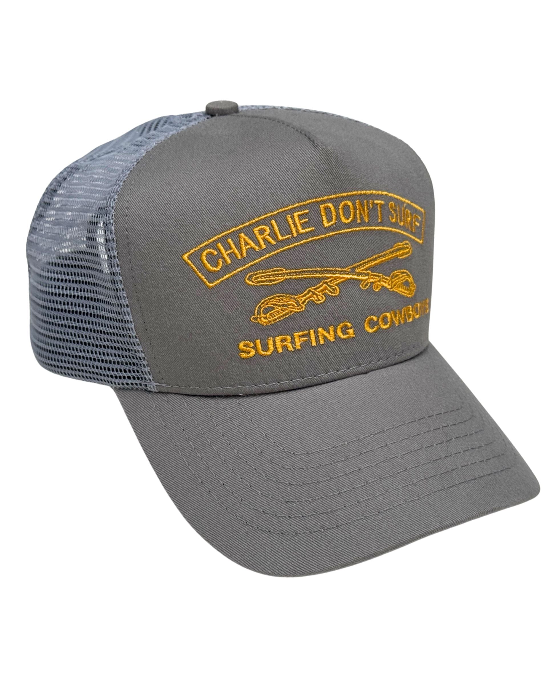 Charlie Don’t Surf Trucker Hat – Dolphin Grey with Gold Embroidery