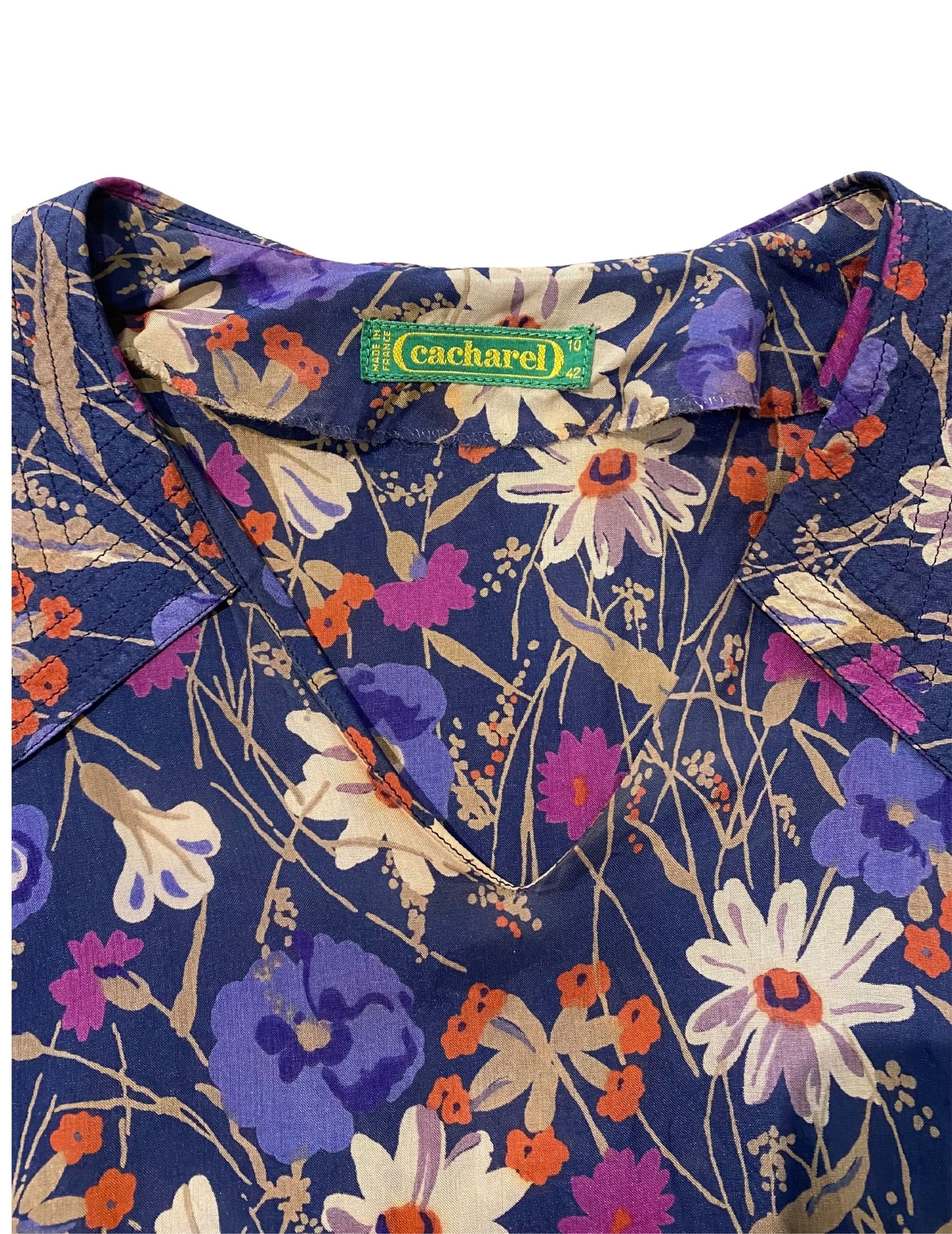 Vintage Cacharel floral dress neckline and label.
