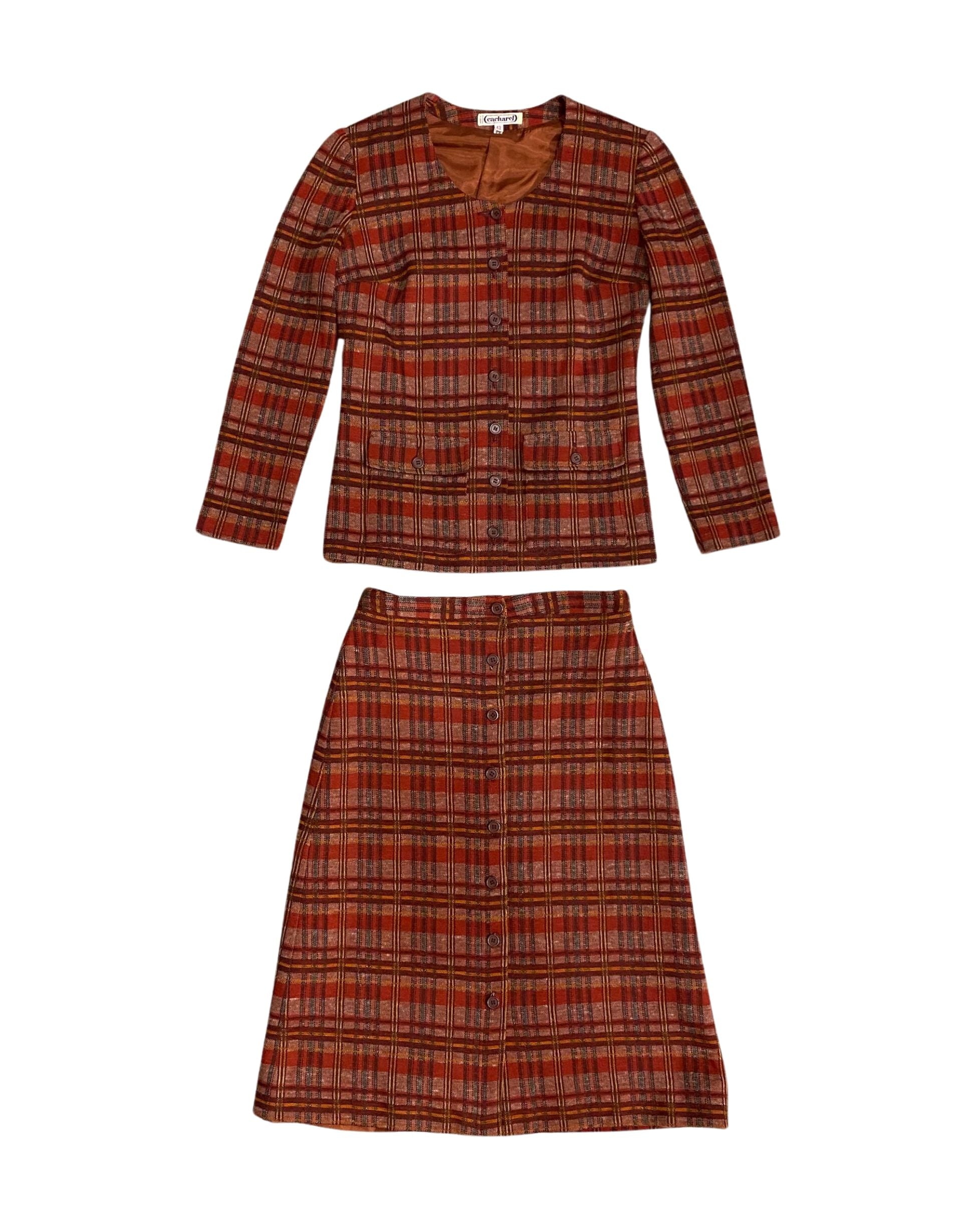 Front view of 1970s Cacharel red and beige plaid skirt suit.