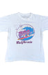 White t-shirt with a colorful graphic of California Raisins design on a white background