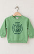 Surfing Cowboys Camp Malibu toddler sweatshirt in Spring Green with navy goat, horseshoe and camp-style graphic.