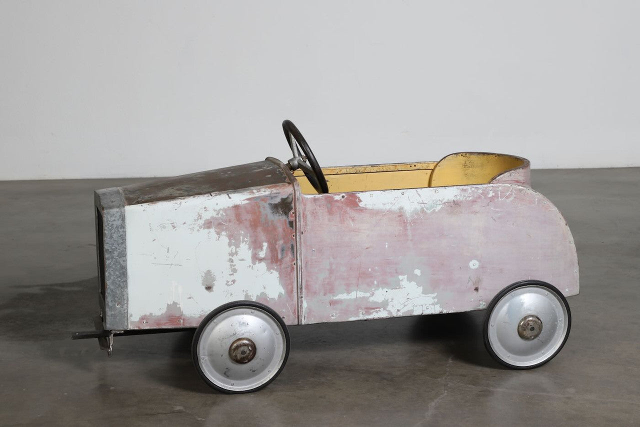 The full view of the left side of the Carnival Car Ride piece, circa 1930s.