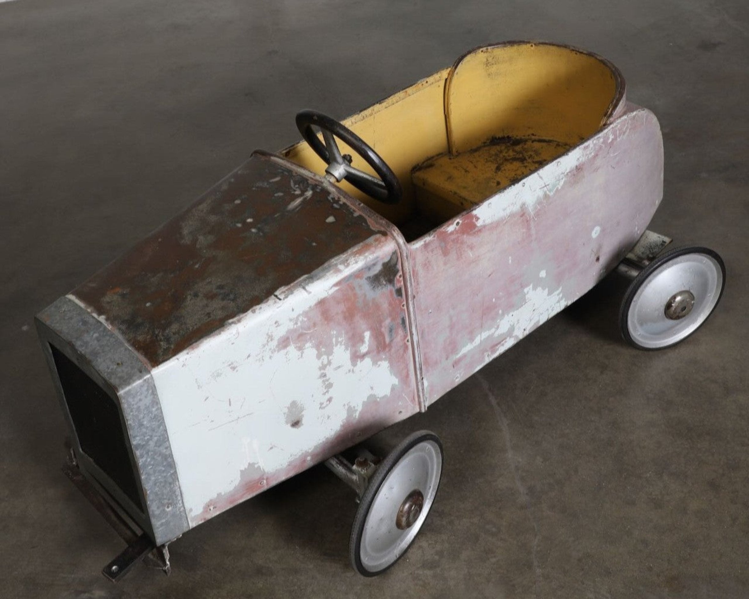 The full view of the left side of the Carnival Car Ride piece, circa 1930s.