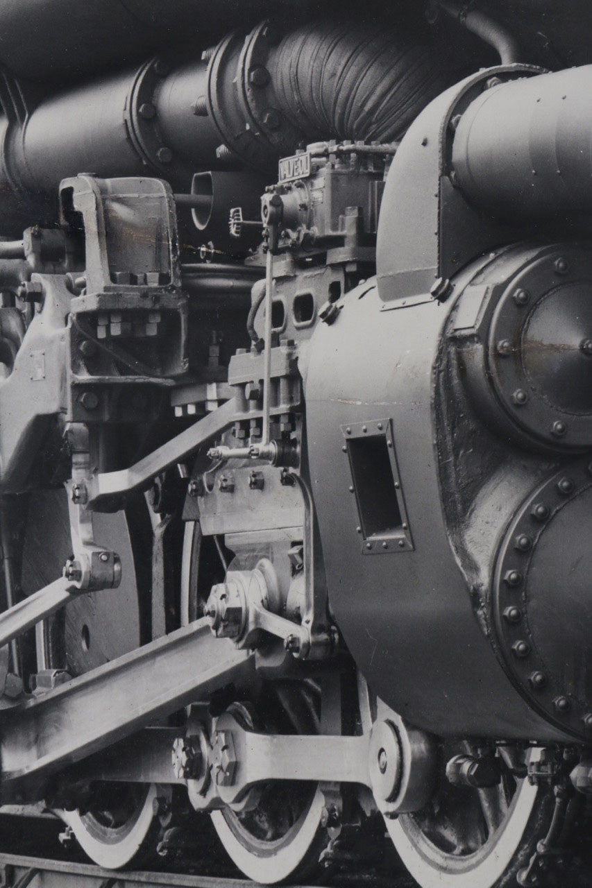 The upclose view of the wheels and parts the 1940s Chesapeake & Ohio Locomotive Train #1633 Black and White Photograph.