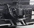 The upclose view of the bottom parts of the 1940s Chesapeake & Ohio Locomotive Train #1633 Black and White Photograph.