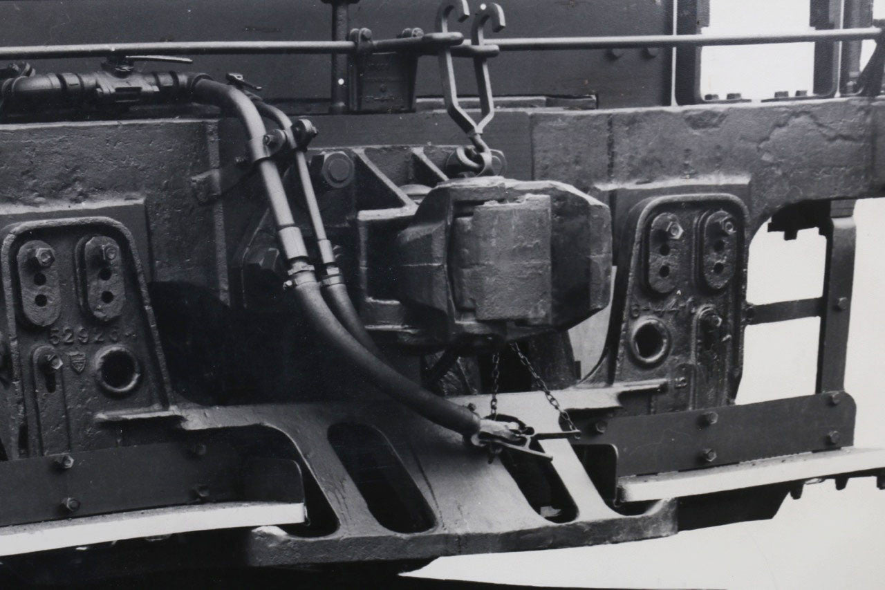 The upclose view of the bottom parts of the 1940s Chesapeake & Ohio Locomotive Train #1633 Black and White Photograph.