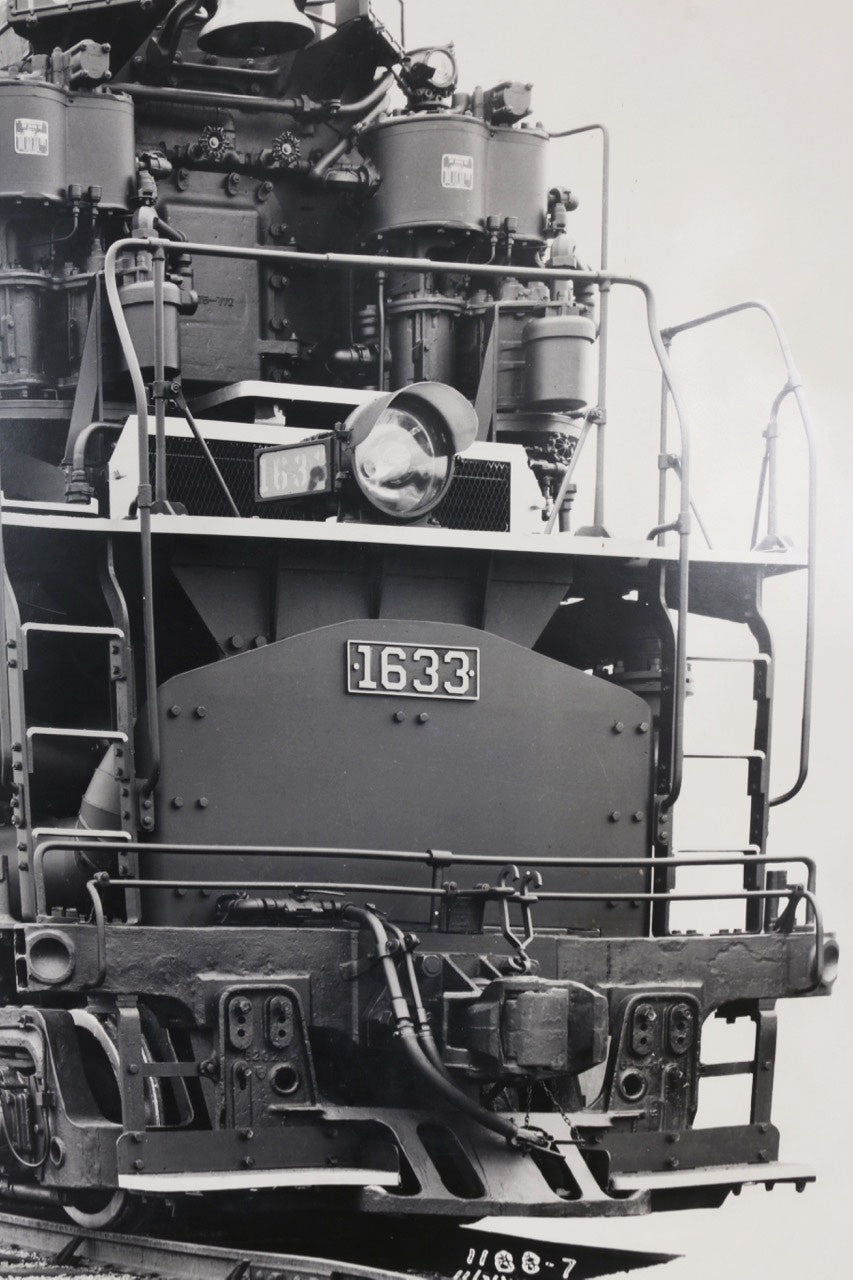 The right side view of the 1940s Chesapeake & Ohio Locomotive Train #1633 Black and White Photograph.