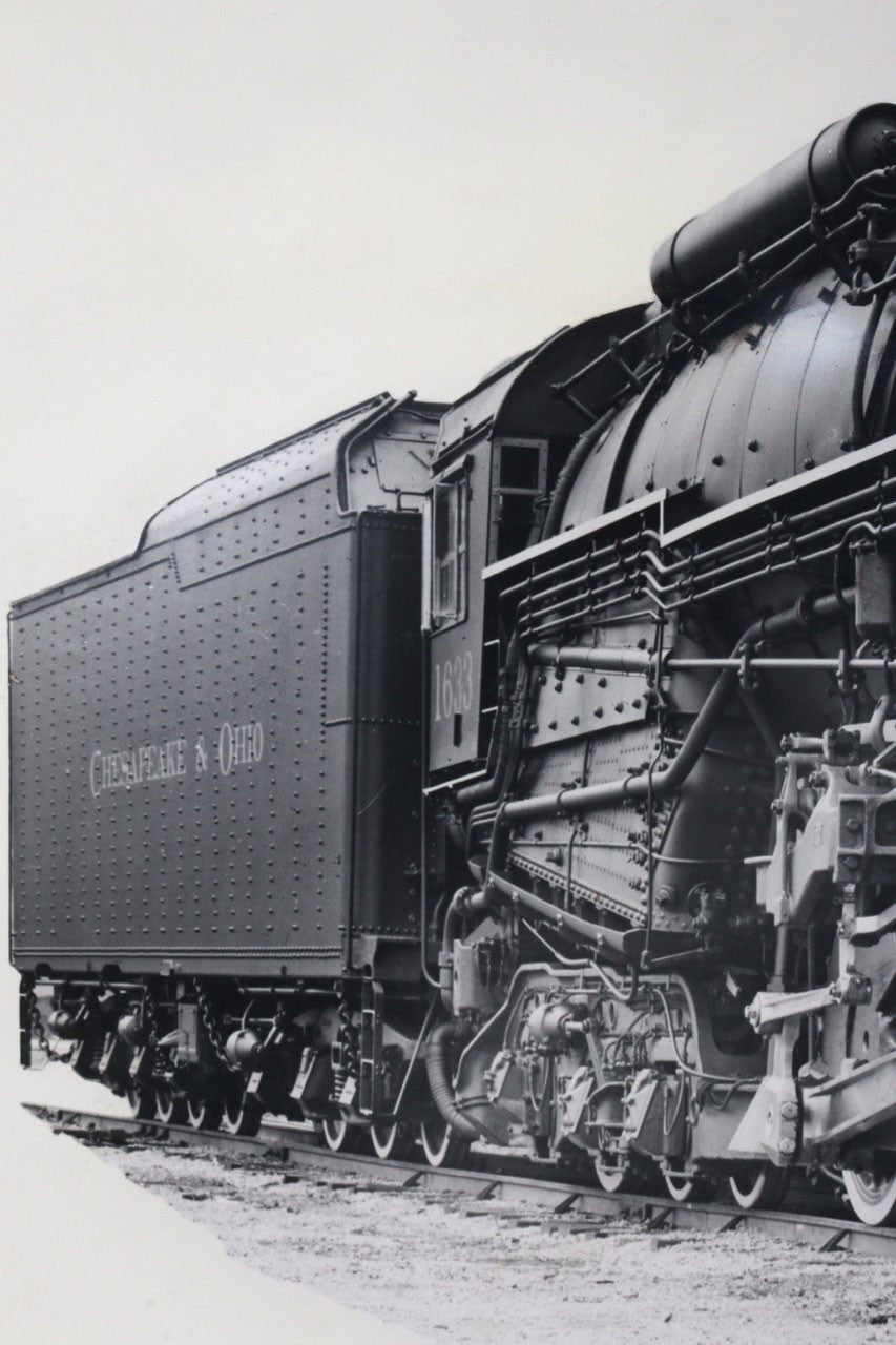 The left side view of the 1940s Chesapeake & Ohio Locomotive Train #1633 Black and White Photograph.