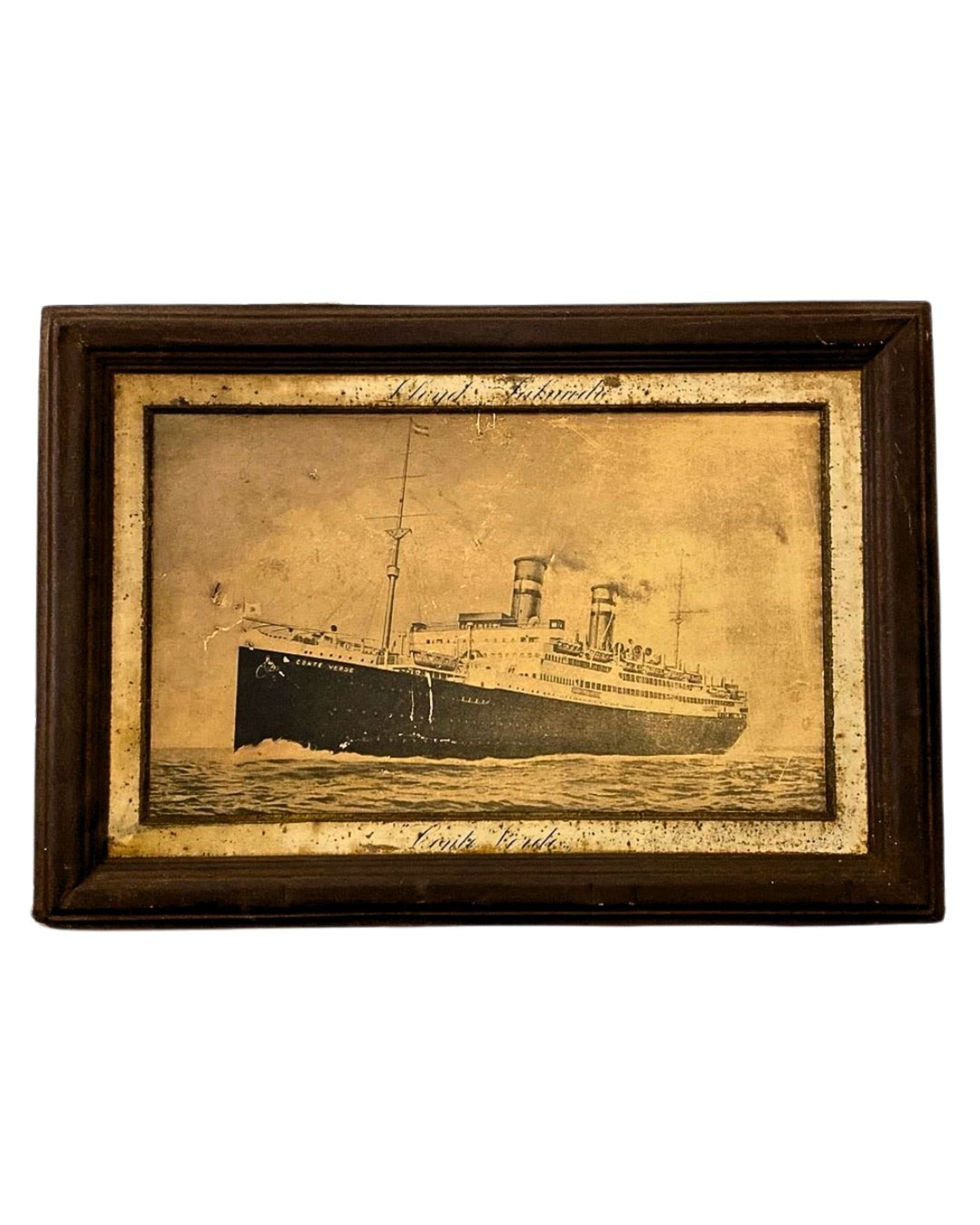 c.1930s printed tin picture of the Italian ocean liner SS Conte Verde with aged sepia finish and integrated metal frame.