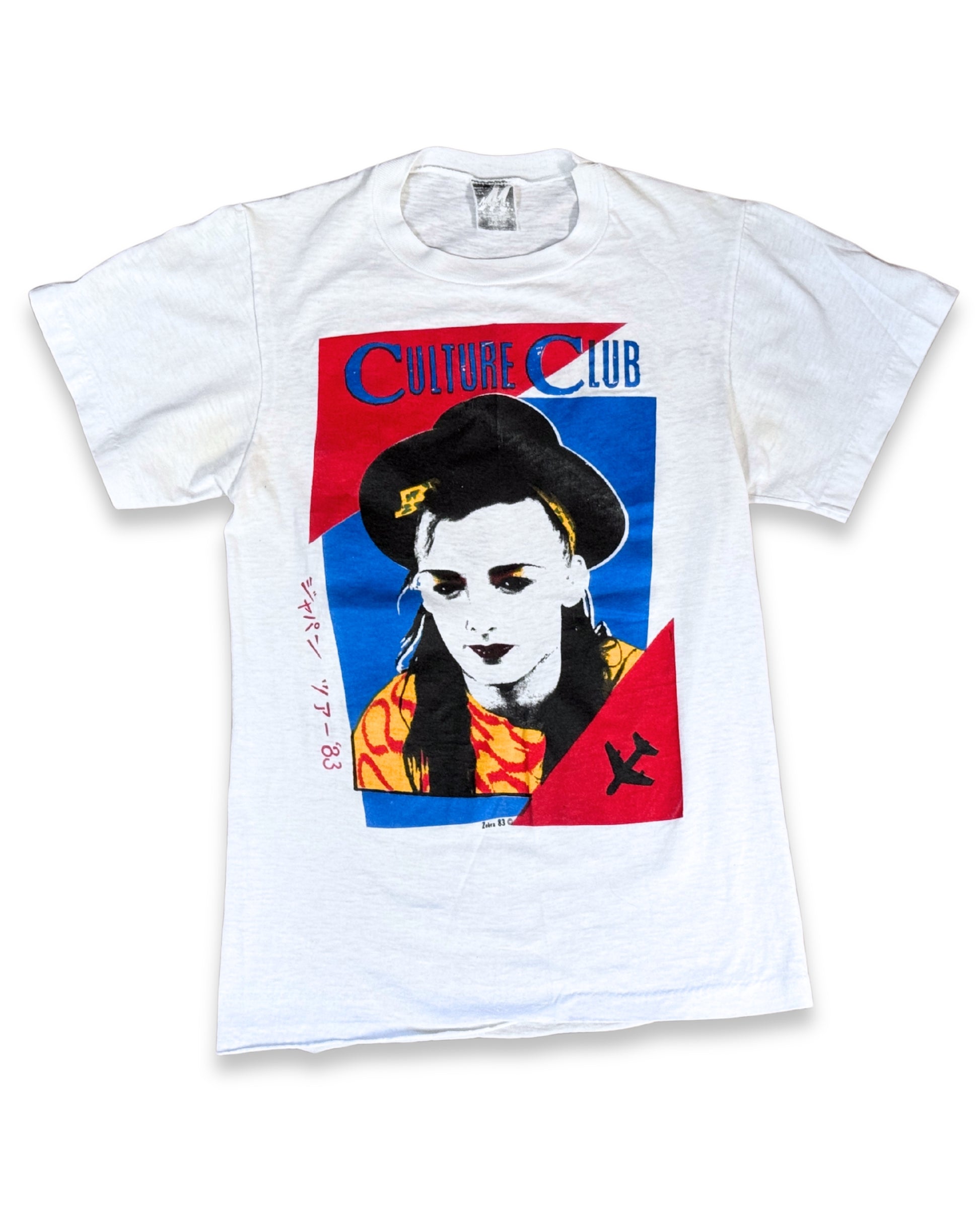 Front view of 1983 vintage Culture Club T-shirt with Boy George portrait graphic and red blue artwork.
