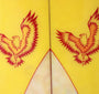 David Nuuwiha Surfboard 1970s Vintage Yellow and Green with Red Accent Close Up of Double Logo on Deck