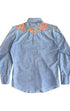 Back view of 1970s embroidered denim shirt showing colorful yoke detail.