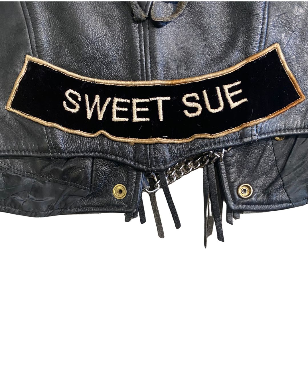 Detailed view of Sweet Sue name patch and Harley Honey embroidery.