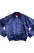 Vintage 1980s Disney Fantasia satin jacket with embroidered Sorcerer Mickey on back and red piping on navy blue satin. Front.