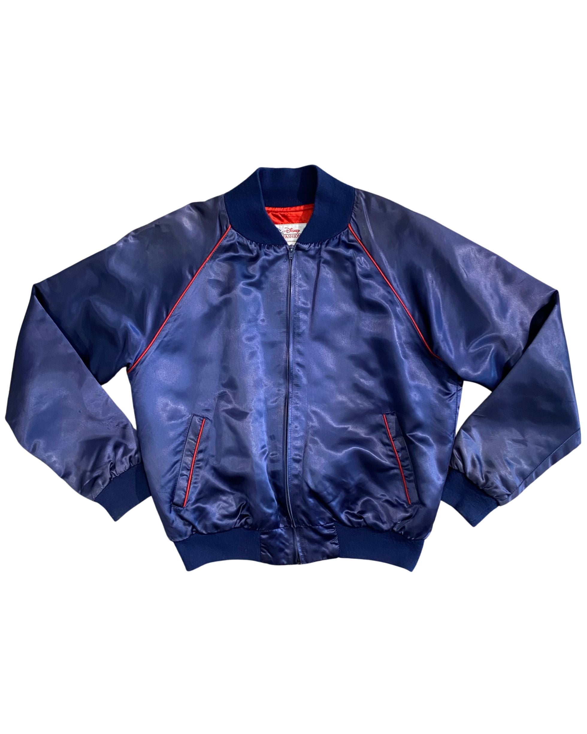 Vintage 1980s Disney Fantasia satin jacket with embroidered Sorcerer Mickey on back and red piping on navy blue satin. Front.