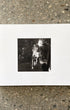 Back cover featuring black-and-white photograph from Drivebys collection.
