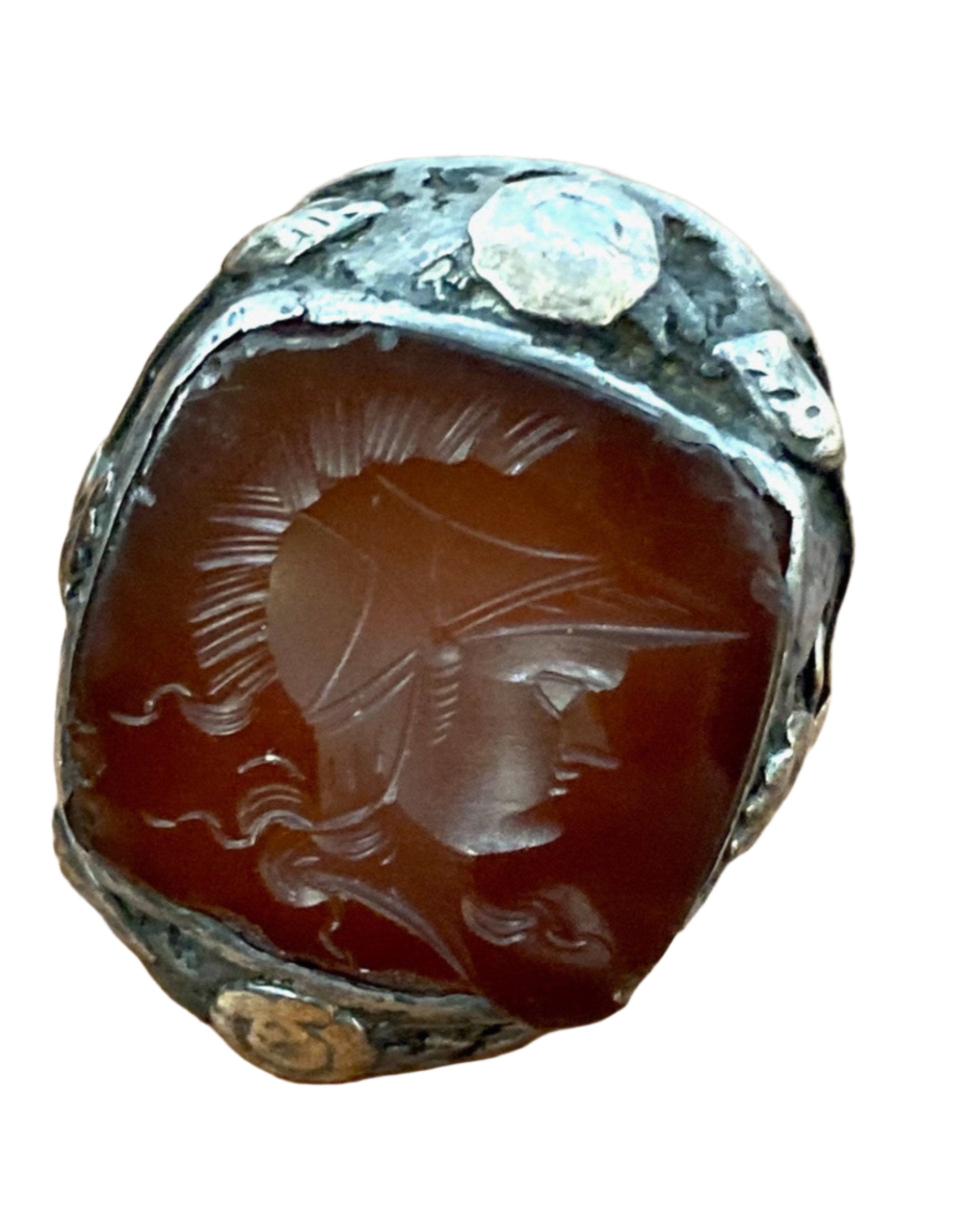 The front view of the Early 1800s Sterling 10K Gold Carnelian Conquistador Ring.