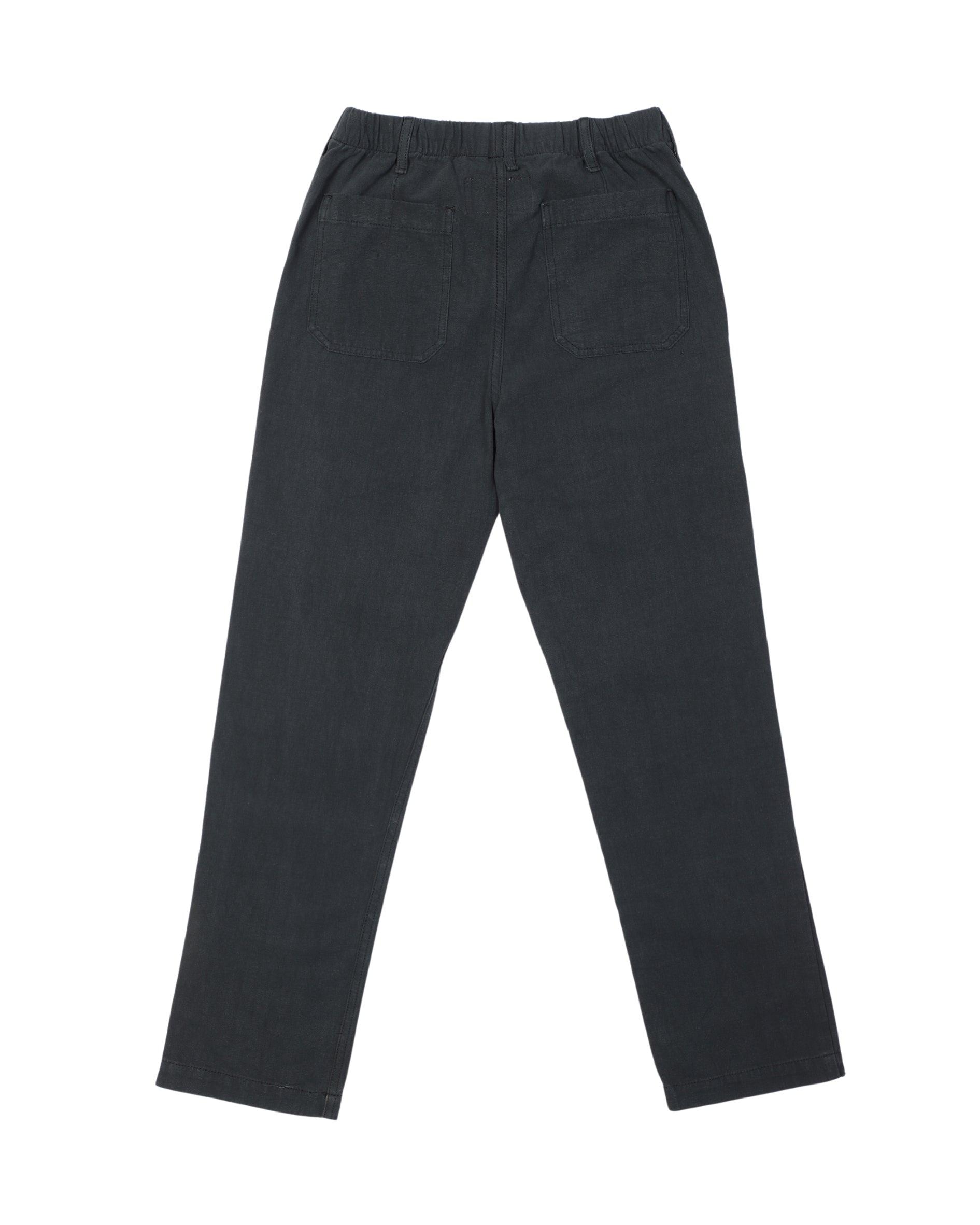 The back side of a pair of washed black cotton canvas easy pants with a straight-leg fit, elastic waist, drawstring, and belt loops.